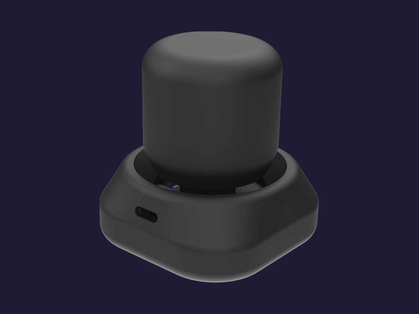 Render del space mouse en negro: una perilla cilíndrica sobre una base de esquinas redondeadas.